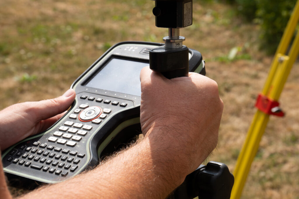 Uitvoering van een opmeting door LSG Landmeters.